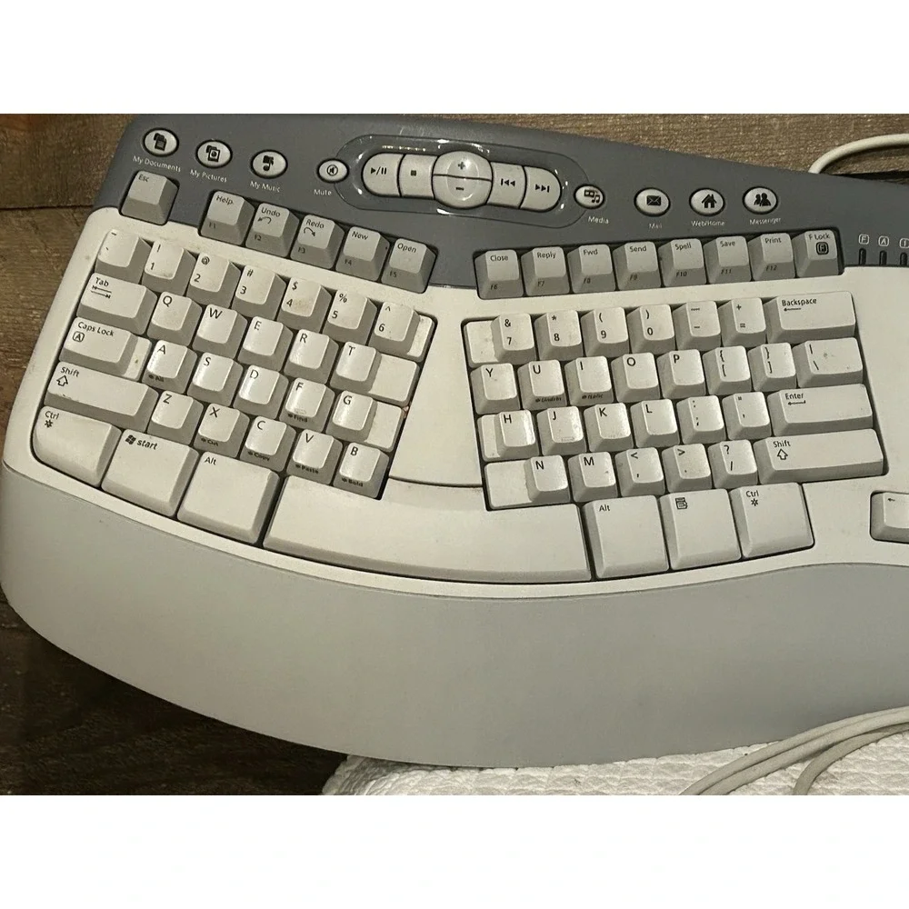 Microsoft Natural Keyboard Ergonomic Comfort Multimedia 1.0A RT9470 Wired PS/2